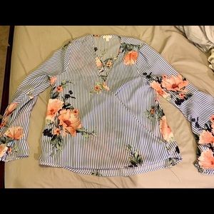 Floral surplice bell sleeve blouse